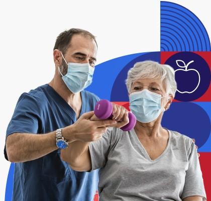 An older woman lifts a dumbbell while a health care provider supports her arm.