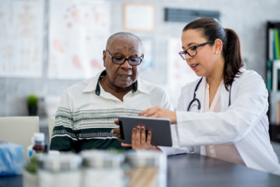 Doctor and Patient going over chart