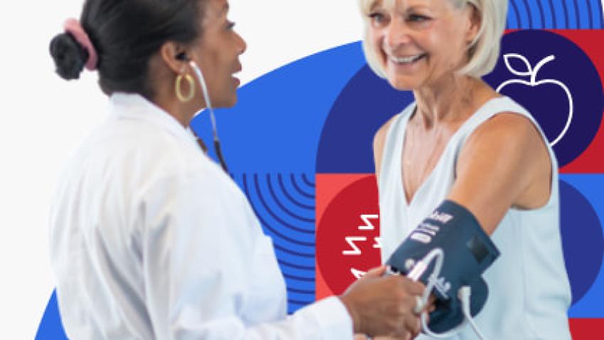 Woman getting her blood pressure checked by health care provider.