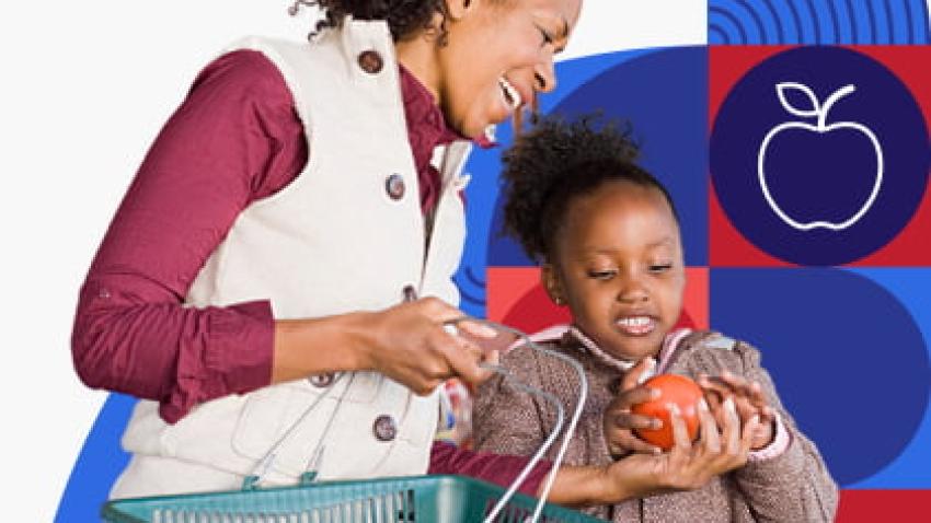 A woman and child look at tomatoes while shopping.