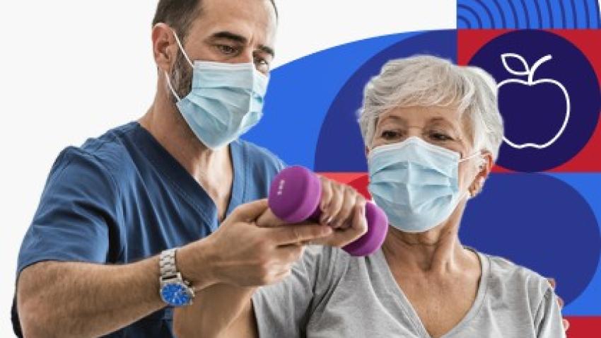 An older woman lifts a dumbbell while a health care provider supports her arm.